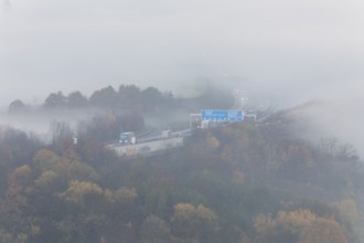 Aichelberg Alb climb of the A8 in thick fog on an autumn morning. Lkr. Göppingen,