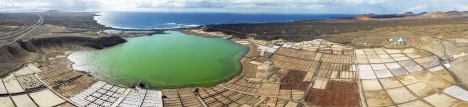 Salt mining plant, Salinas de Janubio with green Laguna de Janubio, near Yaiza, aerial view,