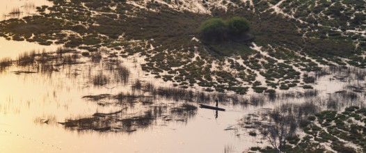 Marshland, marshland, Kavango fishermen with dugout boat, Mokoro, aerial view, Okavango Delta,