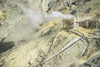 Steaming fumaroles in the Owakudani geothermal area at Komagatake volcano, Hakone, Japan
