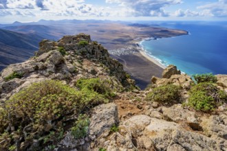Castillejo viewpoint, view from the Risco de Famara cliffs to the coast and the sea with the Famara
