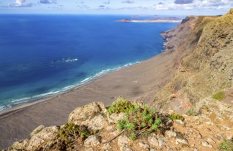 View from the Castillejo viewpoint from the Risco de Famara cliffs to the coast and the sea with