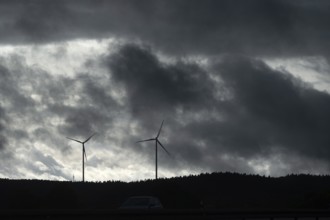 Wind turbines in thunderstorm rain, Bavarian Forest, Bavaria, Germany