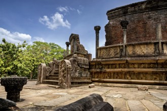 Ancient ruins with richly designed stone sculptures and open-air columns, The temples of