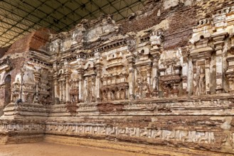 Detailed reliefs on an ancient wall, The temples of Polonnaruwa in Sri Lanka