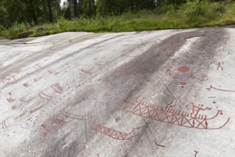 Historic rock carvings of Tanum, here at the Vitlycke site, figurative depiction from the Bronze