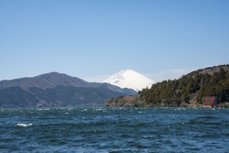 View of Lake Ashi with Mount Fuji volcano and peace torii from Hakone Shrine, Hakone, Japan
