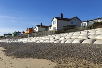 Clifftop houses at risk from coastal erosion, Thorpeness, Suffolk, North Sea coast, England, UK