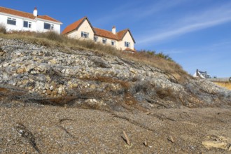 Clifftop houses at risk from coastal erosion, Thorpeness, Suffolk, North Sea coast, England, UK