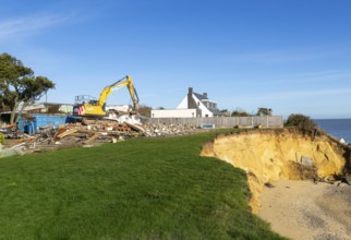 Demolition of Jean Flick's house, The Warren, Thorpeness, Suffolk, England, UK due to rapid coastal