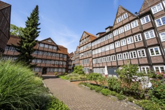 Facades of the historic brick buildings, inner courtyard, view over the city, Peterstraße,