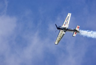 A Jakovlev Jak-55 with the registration LY-AGL during a flight demonstration as part of an air show