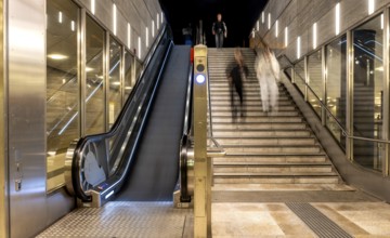 Night photo, long exposure with motion blur, modern underground entrance at Unter den Linden