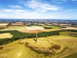 Waterloo Monument over Scottish fields and farms from a drone, Jedburgh, Scotland, UK