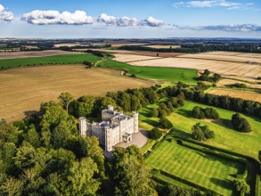 Wedderburn Castle and Barns over fields from a drone, Duns, Berwickshire, Scotland, UK