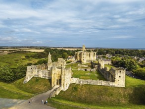 Warkworth Castle over River Coquet from a drone, Warkworth, Northumberland, England, United Kingdom
