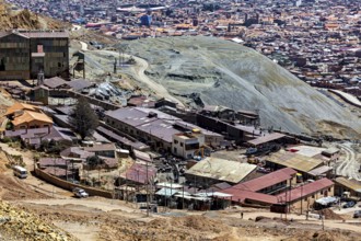 Extensive settlement area with industrial buildings in a barren hilly landscape, The silver mines