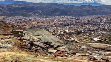 Panoramic view of a wide urban landscape surrounded by majestic mountains and clouds, The silver