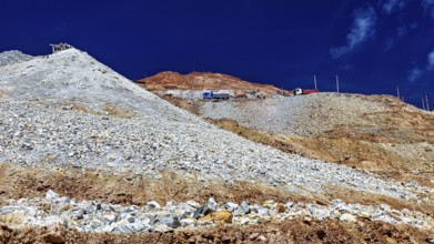 Rocky mountain with loose gravel and blue sky, steeply rising, The silver mines of the Cerro Rico