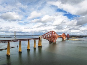 Forth Bridge from a drone, Queensferry Crossing, Forth Estuary, Scotland, United Kingdom