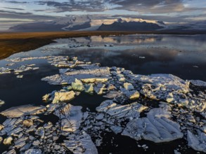 Ice floes, glacier, glacier tongue, fog, clouds, morning mood, mountains, reflection, aerial view,