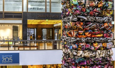 Interior design, artwork made from compressed scrap cars, partially vacant Shopping Quartier 205 in