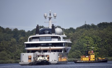 The new superyacht COSMOS leaves the Lürssen shipyard near Rendsburg for the Kiel Canal, Kielkanal,