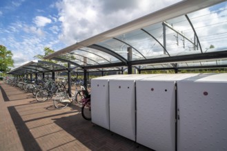 Bicycle parking spaces and boxes on the cycle path in the east of Utrecht, at Utrecht-Lunetten
