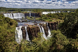 Panoramic views of a waterfall landscape, lush forests and dramatic differences in altitude, The