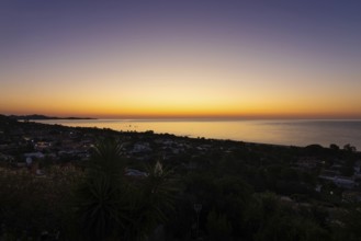 The sun rises on the Costa Rei, a stretch of coastline on the Italian Mediterranean island of