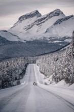 Winter road trip on the Icefields Parkway with lots of snow and ice, Banff National Park, Jasper