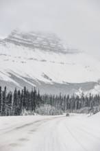 Winter road trip on the Icefields Parkway with lots of snow and ice, Banff National Park, Jasper