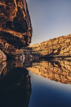 Bell Gorge waterfall, a body of water in north-west Australia in the Kimberley. Sunrise in the