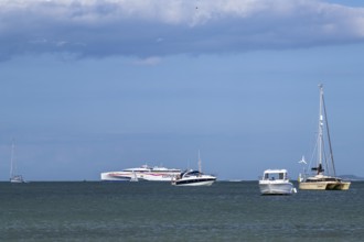 Boats on sea over Knoll Beach Studland, Poole, Dorset, England, United Kingdom