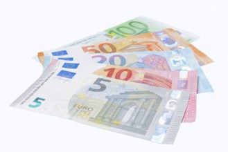 Various euro banknotes on white background, 5 euro, 10 euro, 20 euro, 50 euro, 100 euro
