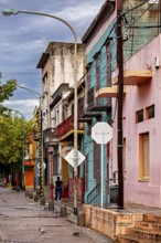 Street with old, colour-faded buildings and a quiet environment, The colourful city and tango