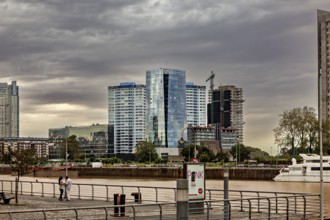Modern buildings along a river on a cloudy day, urban atmosphere, The skyline of Buenos Aires