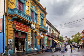 Traditional colourful facade of a shop on an empty city street, The colourful city and tango