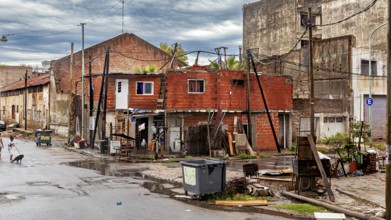 Dilapidated buildings and external structures in an urban environment with a rough atmosphere, the