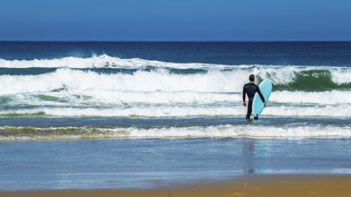 Surfer on Contis beach, Saint Julien en Born, Saint-Julien-en-Born, Landes, France