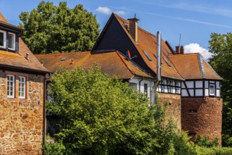 The old town centre with half-timbered houses, church towers and remains of the town wall in
