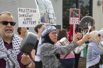 Detroit, Michigan USA - 26 July 2025 - Protesters rally at Eastern Market, banging empty pots to