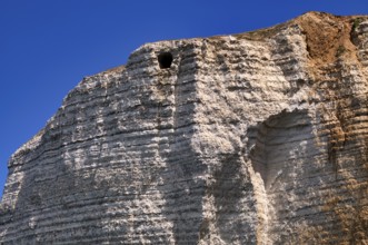 View of the Eye of the Panda, L'oeil du Panda, rock window, cave, in the rock arch Falaise