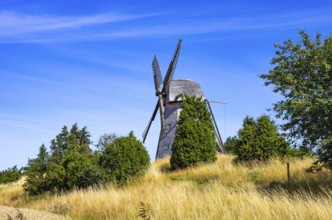 Historic windmill in an epic summer landscape near the burial ground of Stenhusbacken and the