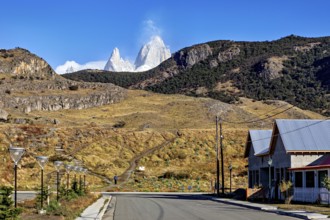 A peaceful little village with a view of rugged mountain peaks and clear skies, the Patagonian