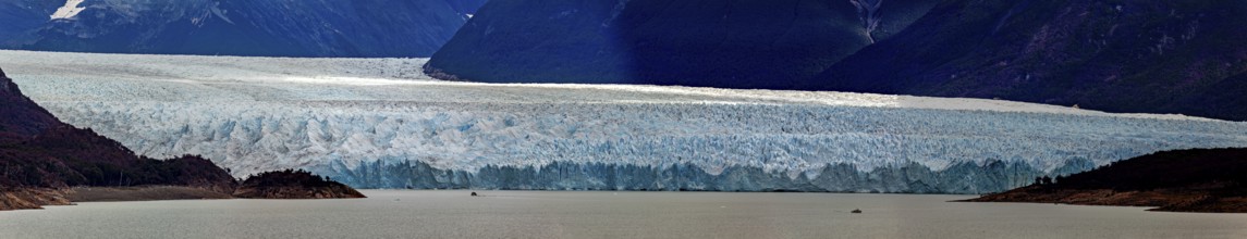 Impressive panorama of a vast landscape with a large glacier above a lake, The Perito Moreno