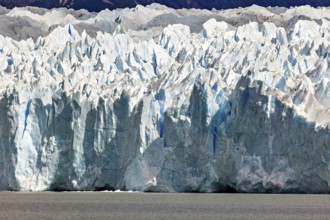 Detailed close-up of an impressive blue glacier wall with striking structures, The Perito Moreno