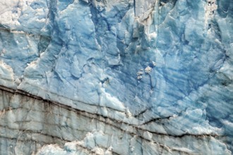 Close-up of blue ice surface with fine lines and natural patterns, The ice of the Perito Moreno