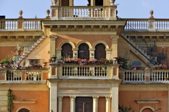 Magnificent city villa Palazzo Rosi with terraces, balconies, balustrades, stairs, arches, columns,