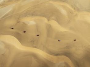 Quad bikes in the dunes of the Namib Desert in the vicinity of the coastal town of Swakopmund.
